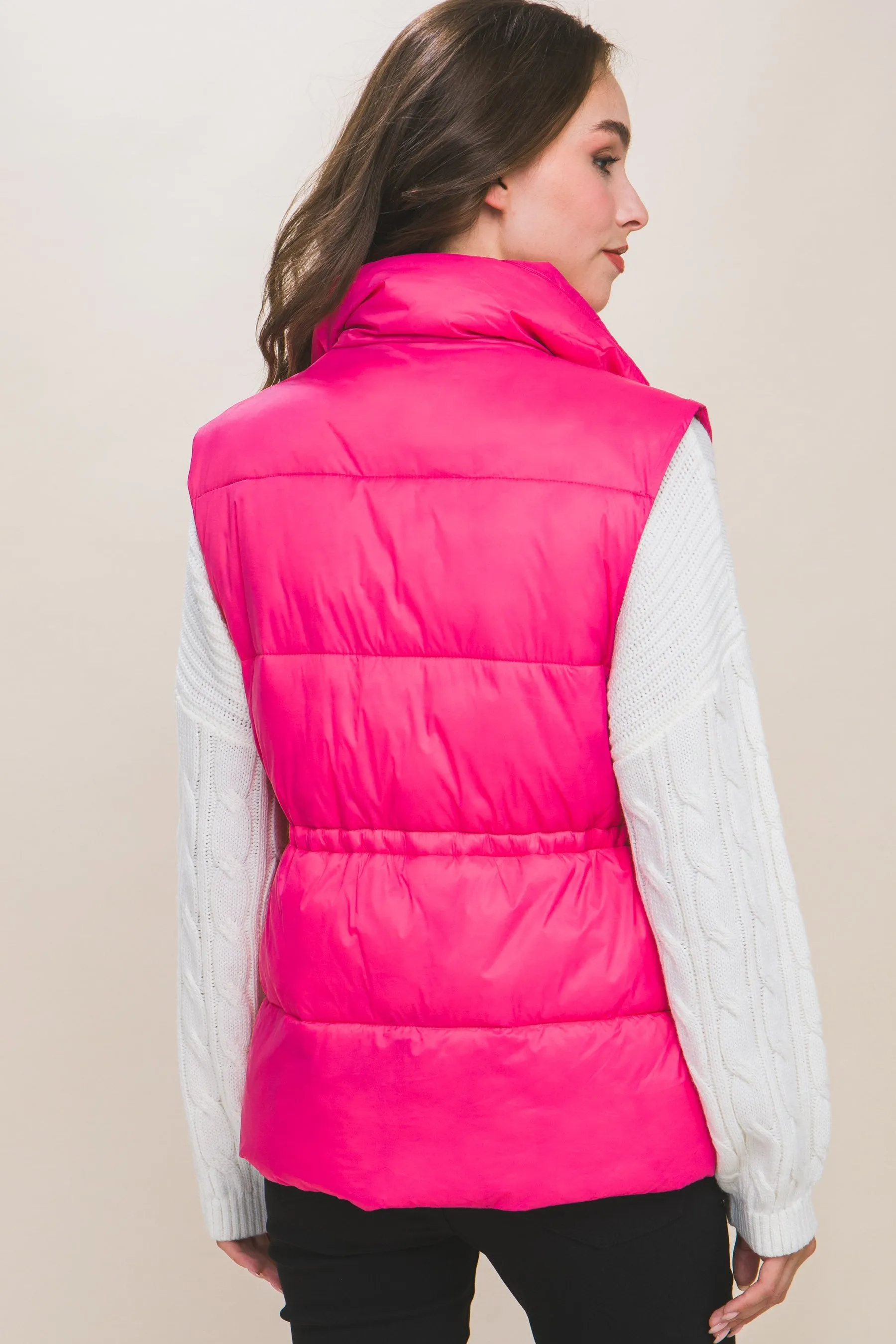 Women's Color Zip up button puffer vest with waist toggles