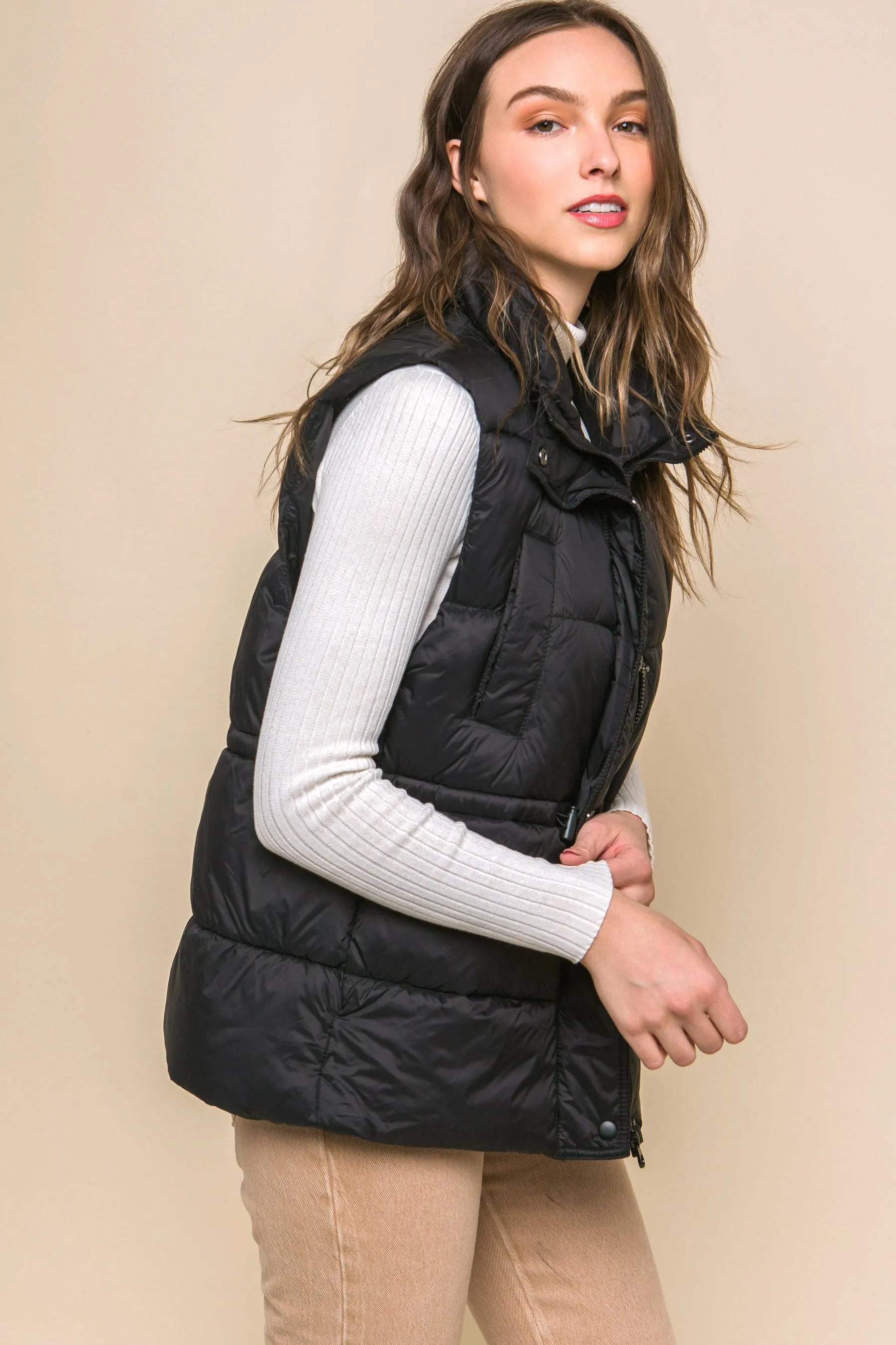 Women's Color Zip up button puffer vest with waist toggles