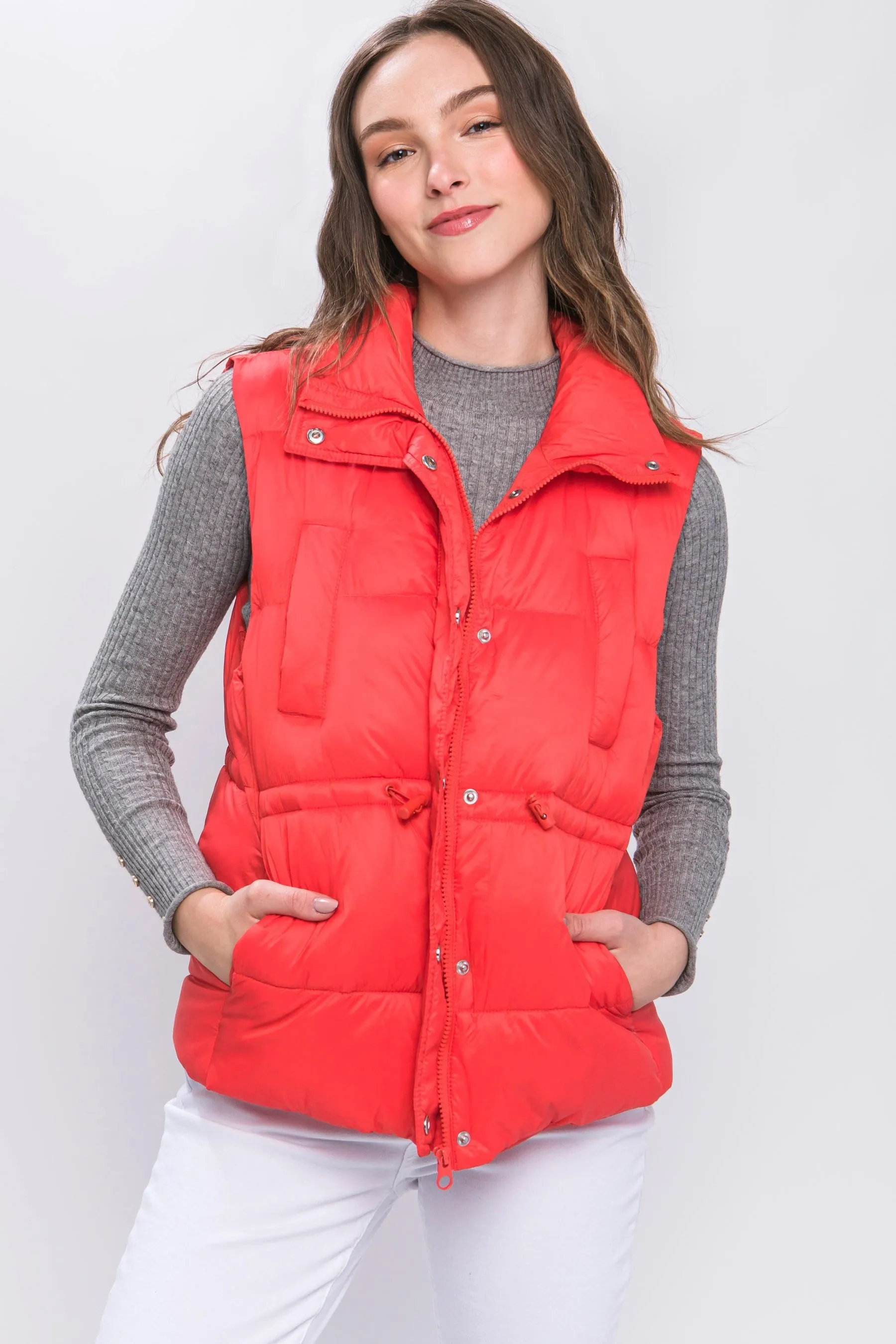 Women's Color Zip up button puffer vest with waist toggles